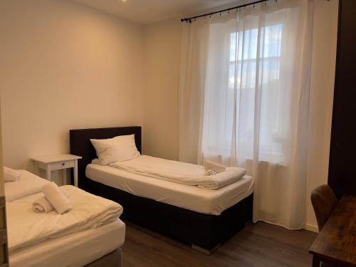 Ένα ή περισσότερα κρεβάτια σε δωμάτιο στο Gemütliches Apartment in Geisenheim