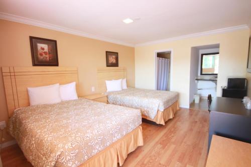 Cama o camas de una habitación en Sinbad Motel