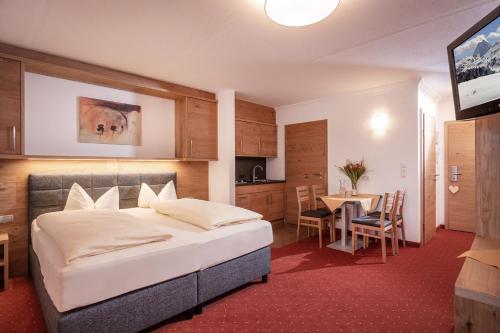 Postel nebo postele na pokoji v ubytování Hotel Kroneck