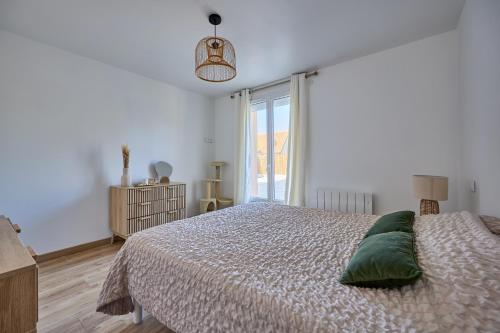 Postel nebo postele na pokoji v ubytování Arielle