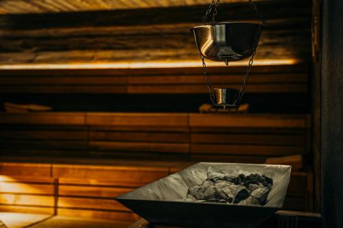 a bowl of food sitting on a table in a sauna at Seeliebe, 300 Meter zum Wasser, mit Terrasse und Garten in Lembruch