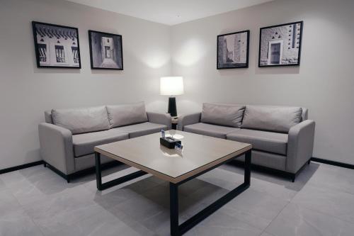 Ruang duduk di Manazel Aldiafah serviced Apartments AlSulymaniyah