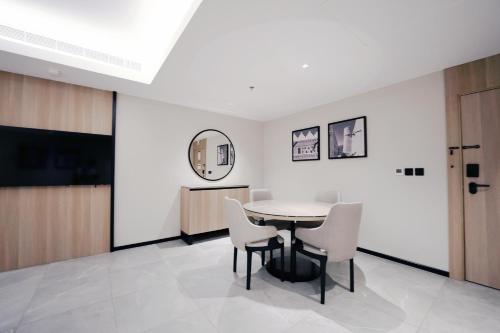 Televisyen dan/atau pusat hiburan di Manazel Aldiafah serviced Apartments AlSulymaniyah