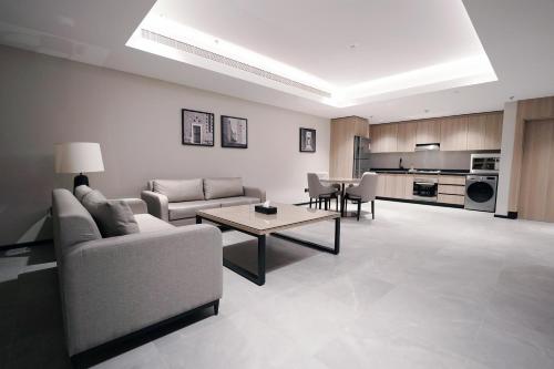 Dapur atau dapur kecil di Manazel Aldiafah serviced Apartments AlSulymaniyah