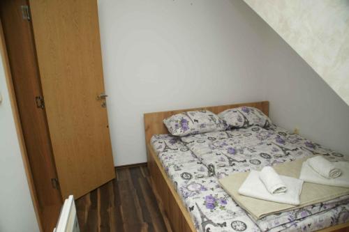 Postel nebo postele na pokoji v ubytování Apartman Jana b