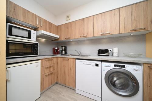 Dapur atau dapur kecil di Appartement centre ville Cauterets