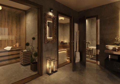 une grande salle de bain avec un lavabo et un miroir dans l'établissement Homency - Résidence L'Expression B11, à L'Alpe-d'Huez