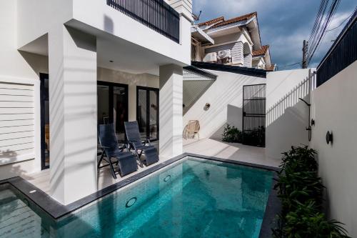 an image of a house with a swimming pool at 5BR Modern Luxury Pool Villa Patong TPSV140 in Patong Beach