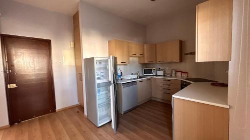 Η κουζίνα ή μικρή κουζίνα στο Bougainvillea