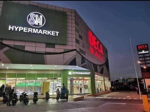 a hyundai store with motorcycles parked in front of it at 888 accommodation in Manila