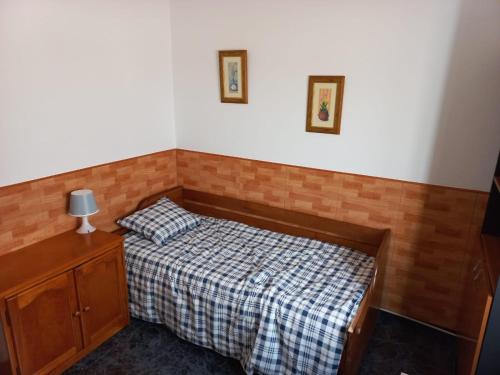 Ένα ή περισσότερα κρεβάτια σε δωμάτιο στο Sunset house