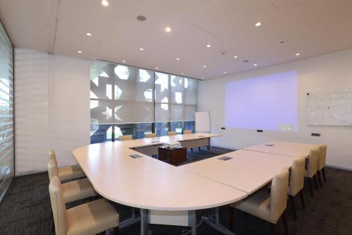 a conference room with a long table and chairs at Hilton Garden Inn Konya in Konya