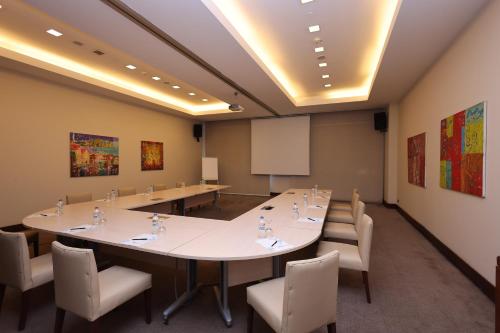 a conference room with a large table and chairs at Hilton Garden Inn Konya in Konya