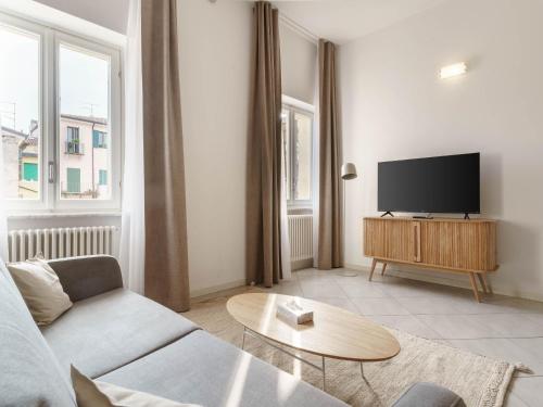 Μια τηλεόραση ή/και κέντρο ψυχαγωγίας στο Limehome Verona La Vigna in Città