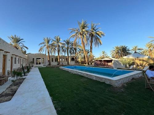 Bazén v ubytování فندق إريغن Erighin siwa hotel nebo v jeho okolí