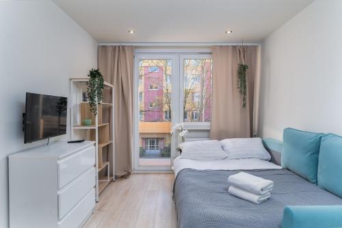 Postel nebo postele na pokoji v ubytování Nad Sudołem Stylish Apartment