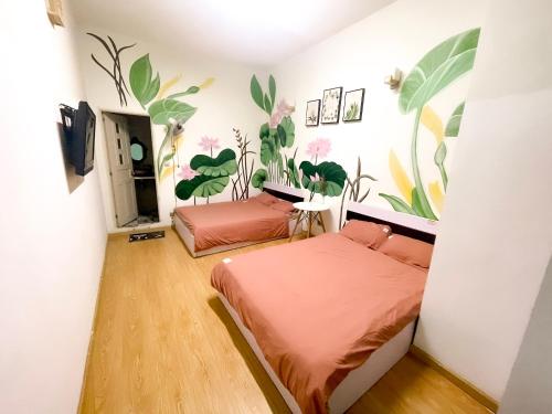 TV a/nebo společenská místnost v ubytování Xenia Đà Lạt 2