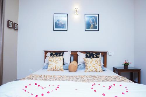 Square One CONDO - Kiribathgoda Kelaniyaにあるベッド