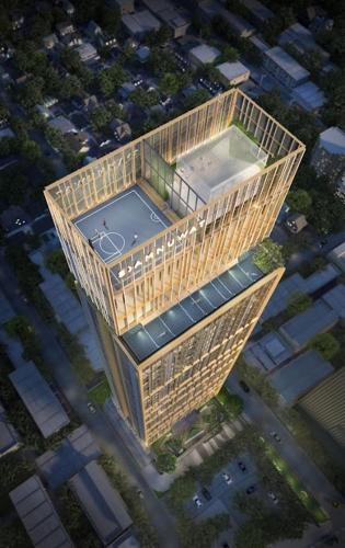 an overhead view of a building with a tennis court in it at Brand New Condo in Bangkok