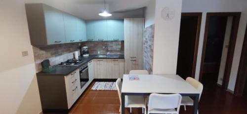 Kuchyň nebo kuchyňský kout v ubytování Casa Dami