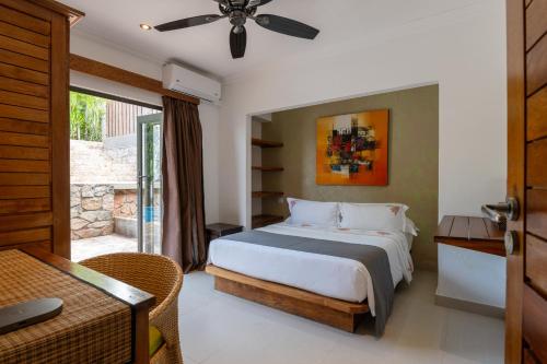 Voodi või voodid majutusasutuse Hotel Le Duc de Praslin toas