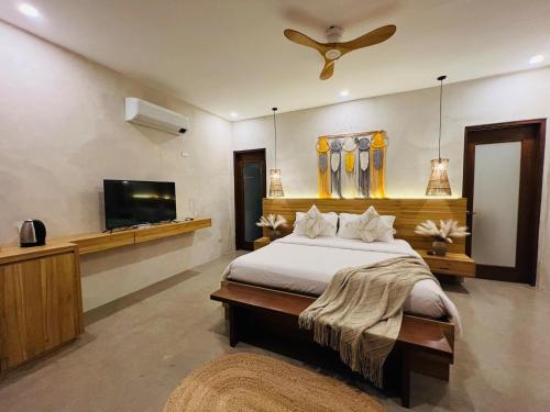 Postel nebo postele na pokoji v ubytování Lio Villas Resort