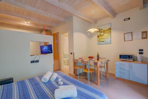 Postel nebo postele na pokoji v ubytování Passeggiata Apartments