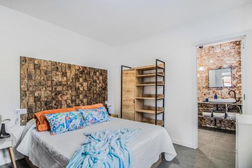 Ένα ή περισσότερα κρεβάτια σε δωμάτιο στο Telde City Loft With Solarium