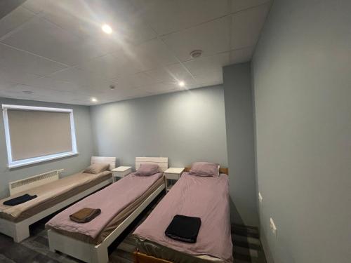 Postel nebo postele na pokoji v ubytování HOSTEL/HOTELL 3A
