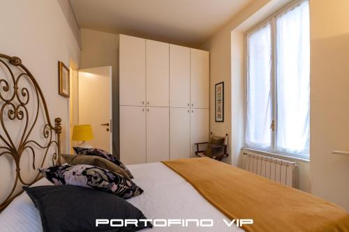 En eller flere senge i et værelse på Nini by PortofinoVip