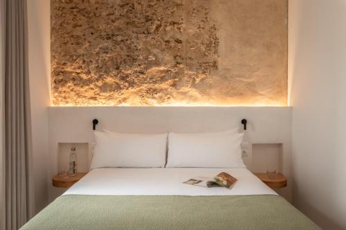 Letto o letti in una camera di BYPILLOW Casa Gades