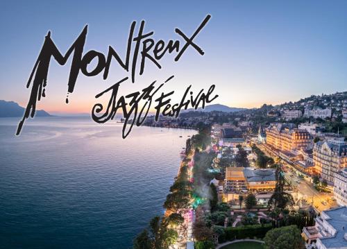 a view of the city of montenegrin kaptik island at Montreux Central Boutique Apartment Lake View and Terrace in Montreux