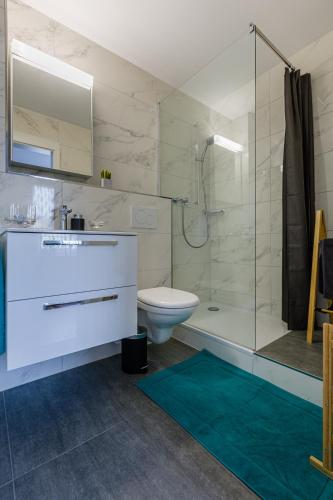 Vonios kambarys apgyvendinimo įstaigoje Apartments Eichenstrasse