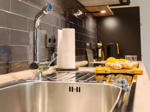 Kuchyň nebo kuchyňský kout v ubytování Lio Suite Deluxe Apartment Küche Terrasse Parken Netflix