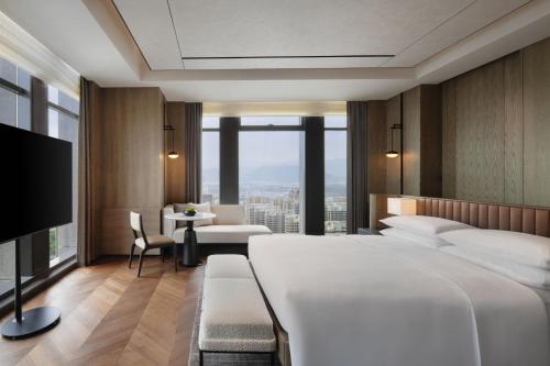 Sheraton Lanzhou Anningにあるテレビまたはエンターテインメントセンター