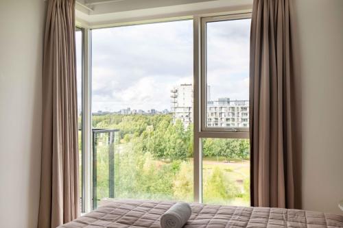 Postel nebo postele na pokoji v ubytování Stylish 3BR Apartment w Two Balconies