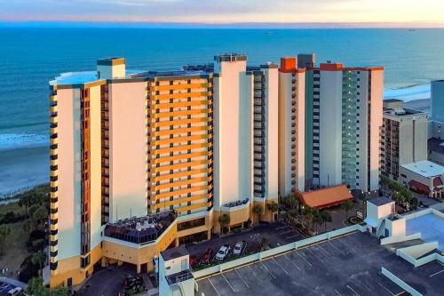 an overhead view of a large building near the ocean at WINTER RATES! Captivating Coastal Charm - Oceanview Suite! PG 504 in Myrtle Beach