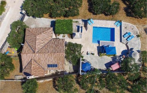 an overhead view of a house with a swimming pool at House Ita in Postira