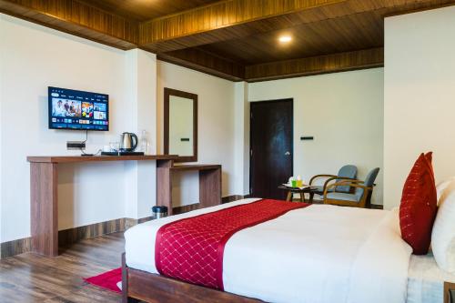 Μια τηλεόραση ή/και κέντρο ψυχαγωγίας στο Sparrow Cherry Resort 2 min walk To MG Marg