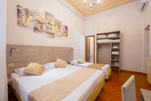 Ένα ή περισσότερα κρεβάτια σε δωμάτιο στο Lilium Hotel