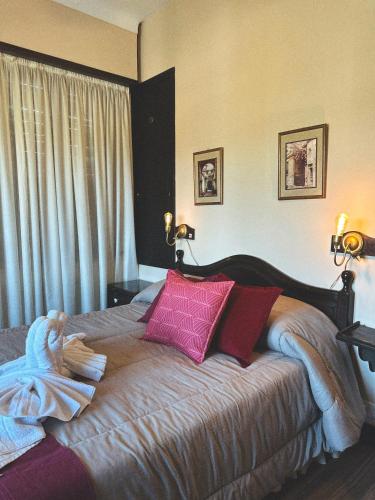 Ένα ή περισσότερα κρεβάτια σε δωμάτιο στο Juliette Posada Boutique Ex Posada La Villa