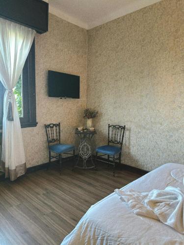 Ένα ή περισσότερα κρεβάτια σε δωμάτιο στο Juliette Posada Boutique Ex Posada La Villa