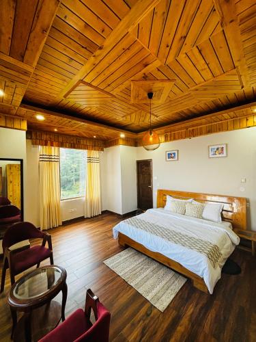 Ένα ή περισσότερα κρεβάτια σε δωμάτιο στο Hilly Horizon BnB Kufri