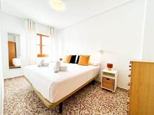 En eller flere senge i et værelse på MyFlats Calm Beach