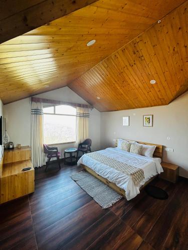 Ένα ή περισσότερα κρεβάτια σε δωμάτιο στο Hilly Horizon BnB Kufri