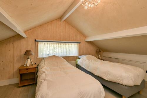 Ένα ή περισσότερα κρεβάτια σε δωμάτιο στο Loevesteijn - Ouddorp