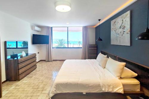 Postel nebo postele na pokoji v ubytování Villa Mirasol Hotel