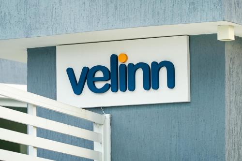 a walmart sign on the side of a building at VELINN Pousada Angra Sunset in Angra dos Reis