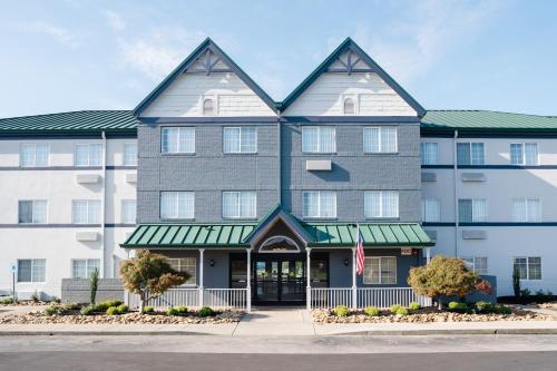 a rendering of the front of a building at MainStay Suites Knoxville Airport in Alcoa