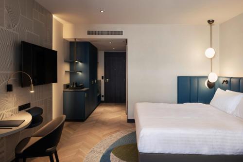 Postel nebo postele na pokoji v ubytování Luxembourg Marriott Hotel Alfa